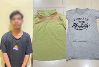 Terduka Pelaku MAA asal Kecamatan Selaparang Mataram diamankan Polisi bersama barang bukti 1 baju lengan panjang warna hijau, dan 1 lembar baju kaos lengan pendek tulisan Embrace the Madness. (Polresta Mataram)