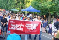 PLN NTB mensosialisasikan program Promo Tambah Daya Diskon 50% di acara car free day Udayana. Minggu (18/05/2025). Foto (PLN NTB)